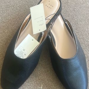 a new day Slip on me or color black size 12 new in box.